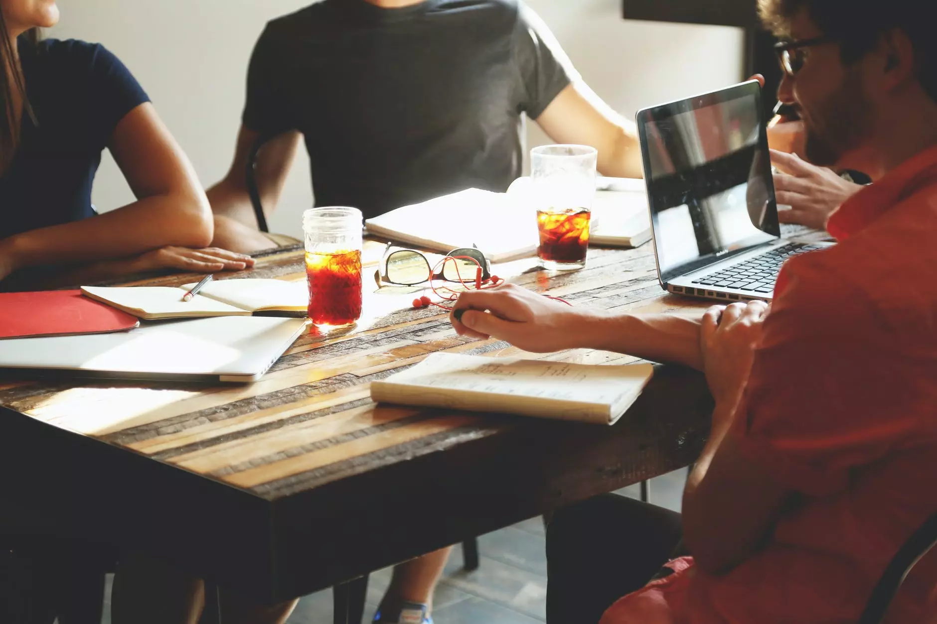 the team communicates at the table